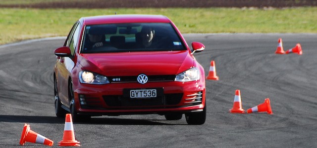 Driving test through lines of cones.